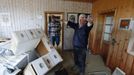 Wood mercantilist Walter Hundshammer, 73, rises his arms to demonstrate the height of the water levels of the nearby Danube river that devastated his house and his firm founded by his grandfather in 1909 in Natternberg, a suburb of the eastern Bavarian city of Deggendorf, June 10, 2013. REUTERS/Wolfgang Rattay (GERMANY - Tags: DISASTER ENVIRONMENT)