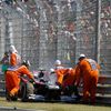 Williams Formula One driver Bottas is pushed out of the track by marshals during the Hungarian F1 Grand Prix in Mogyorod