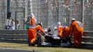 Williams Formula One driver Valtteri Bottas of Finland is pushed out of the track by marshals after failing to complete in the Hungarian F1 Grand Prix at the Hungaroring