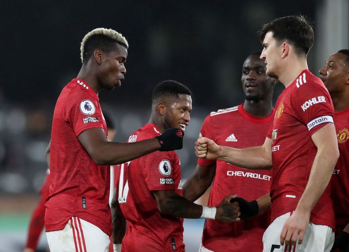 Paul Pogba a Harry Maguire slaví branku United