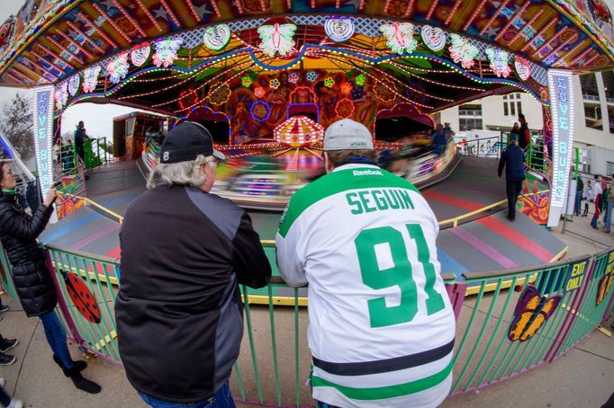 Jan 1, 2020; Dallas, Texas, USA; A view of the Dallas Stars fans and Nashville Predators fans and the fair park midway and the rides before the 2020 Winter Classic hockey