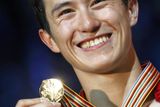 Ze zlaté medaile se radoval podle očekávání kanadský obhájce titulu Patrick Chan.