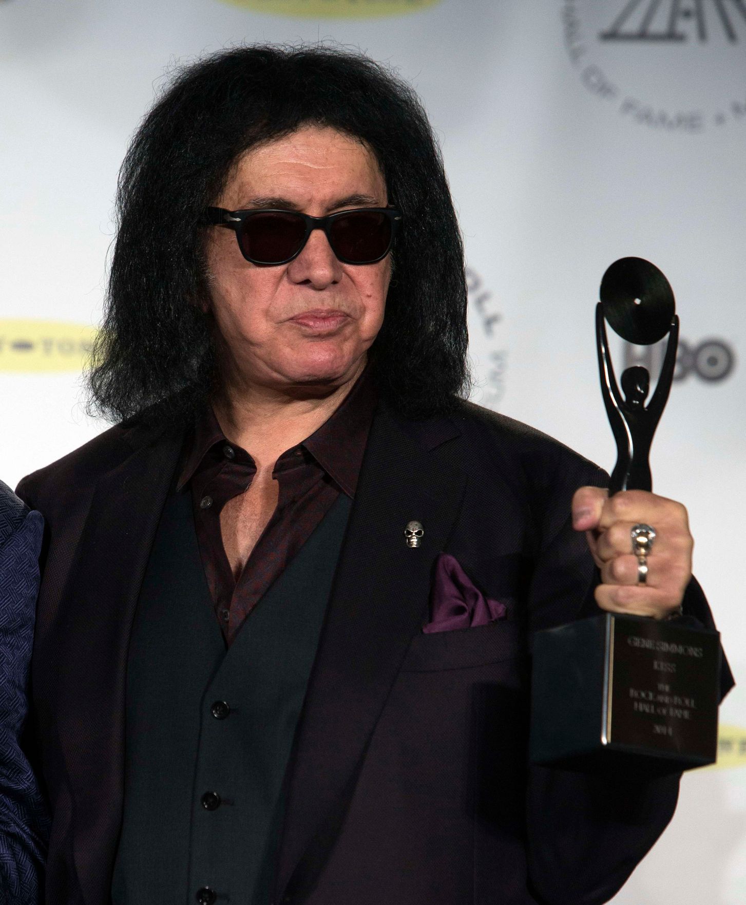Musician Simmons of rock band Kiss poses for pictures after being inducted at 29th annual Rock and Roll Hall of Fame Induction Ceremony in Brooklyn, New York