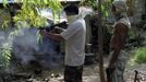 Filipino gunsmiths test fire weapons, which they produced in an illegal makeshift gun factory, on the outskirts of Danao in central Philippines July 8, 2012. In the Philippines, they vote with their trigger fingers. Elections mean big business for illegal gunsmiths, who are looking forward to 2013 mid-term polls. With election-related violence commonplace, the Philippines imposes a ban on the carrying of guns for six months, from campaigning to the proclamation of winners. Picture taken July 8, 2012. To match Feature PHILIPPINES-GUNS/ REUTERS/Erik De Castro (PHILIPPINES - Tags: SOCIETY POLITICS BUSINESS CRIME LAW) Published: Čec. 29, 2012, 2:27 dop.