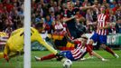 Atletico Madrid's Jan Oblak saves from Bayern Munich's Robert Lewandowski