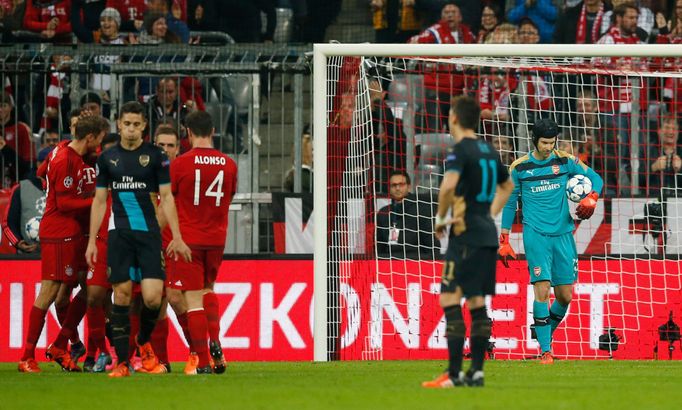 Arsenal's Petr Cech looks dejected after Thomas Muller scored the second goal for Bayern Munich