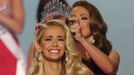 Olivia Jordan of Oklahoma is crowned 2015 Miss USA by Miss USA 2014 Nia Sanchez after winning the 2015 Miss USA beauty pageant in Baton Rouge, Louisiana