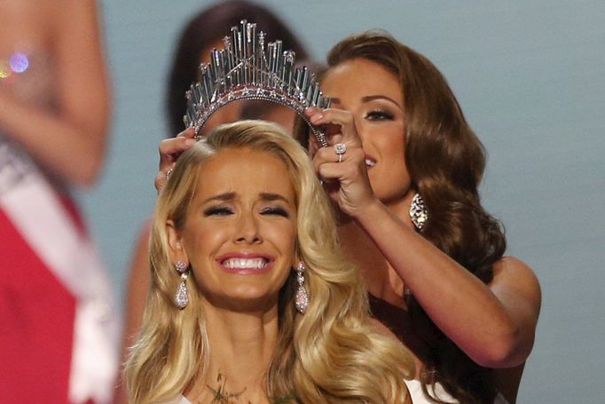 Olivia Jordan of Oklahoma is crowned 2015 Miss USA by Miss USA 2014 Nia Sanchez after winning the 2015 Miss USA beauty pageant in Baton Rouge, Louisiana