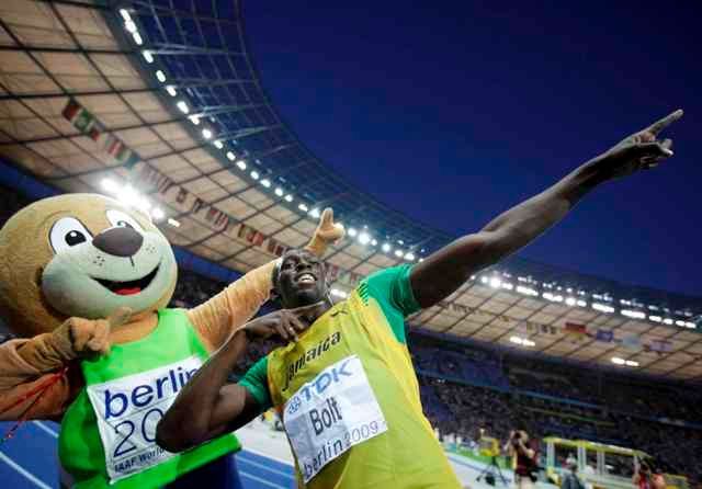 Usain Bolt s maskotem šampionátu