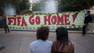 Protesters demonstrate against the public spending for the 2014 World Cup, in Rio de Janeiro, June 15, 2014. Police blocked the streets to keep demonstrators from reachin