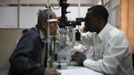 Ethiopian doctor Fikru Melka (R) checks his patient's eyes at the Tilganga Eye Center in Kathmandu April 26, 2012. About 150,000 of Nepal's 26.6 million people are estimated to be blind in both eyes, most of them with cataracts. Picture taken April 26, 2012. REUTERS/Navesh Chitrakar (NEPAL - Tags: HEALTH SOCIETY POVERTY) Published: Kvě. 2, 2012, 4:57 dop.