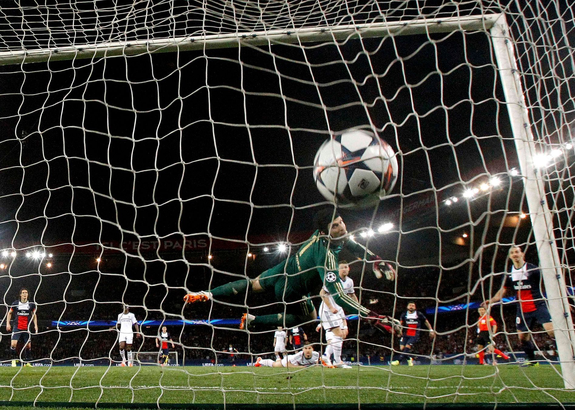 Chelsea goalkeeper Cech fails to catch the ball as Paris St Germain's Lavezzi scored the first goal for the team during their Champions League quarter-final first leg soccer match against Chelsea at t