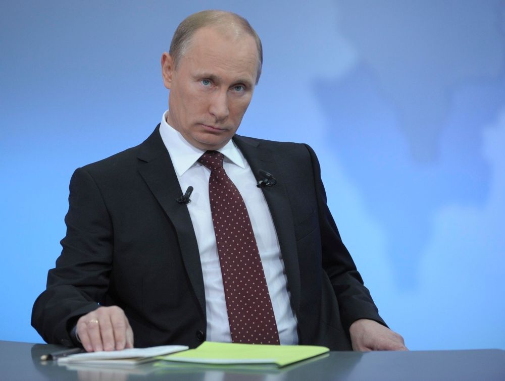 Vladimír Putin při TV debatě s občany