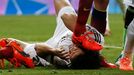 Barcelona's Busquets steps on the face of Real Madrid's Pepe during La Liga's second 'Clasico' soccer match in Madrid