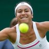 Heather Watson of Britain hits a return to Madison Keys of t