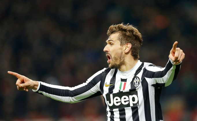 Llorente slaví gól do sítě AC Milán