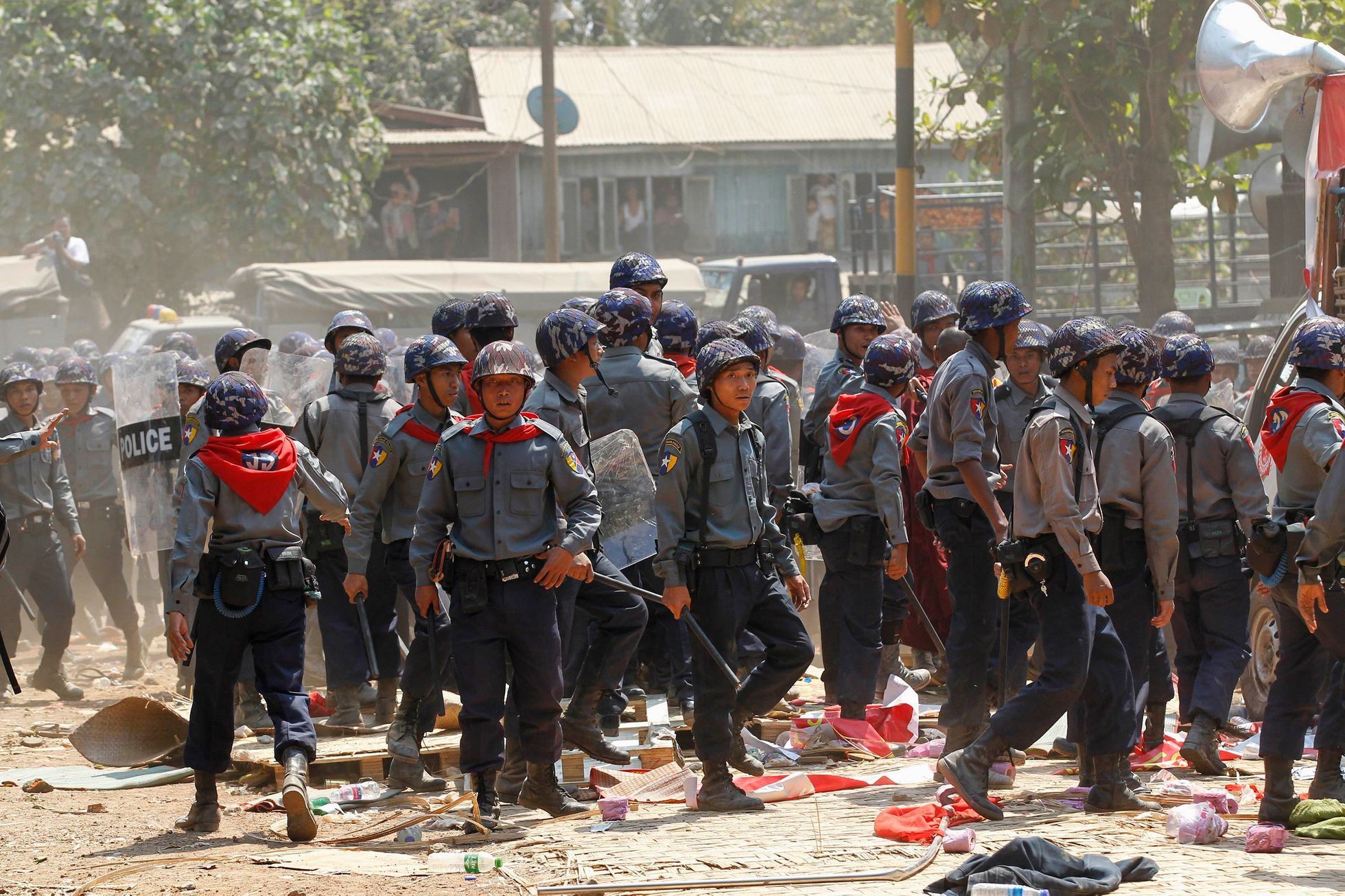 Police are seen during the violence in Letpadan