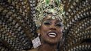 Drum queen Cris Vianna from Imperatriz Leopoldinense samba school participates during the annual Carnival parade in Rio de Janeiro's Sambadrome, February 12, 2013. REUTERS/Pilar Olivares (BRAZIL - Tags: SOCIETY) Published: Úno. 12, 2013, 5:55 dop.