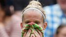 Mathilde Johansson of France sits in her seat after losing the first set during her women's singles tennis match against Agnieszka Radwanska of Poland at the Wimbledon Te