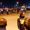 Police control the site of a stampede that occurred during a New Year's celebration on the Bund, in central Shanghai