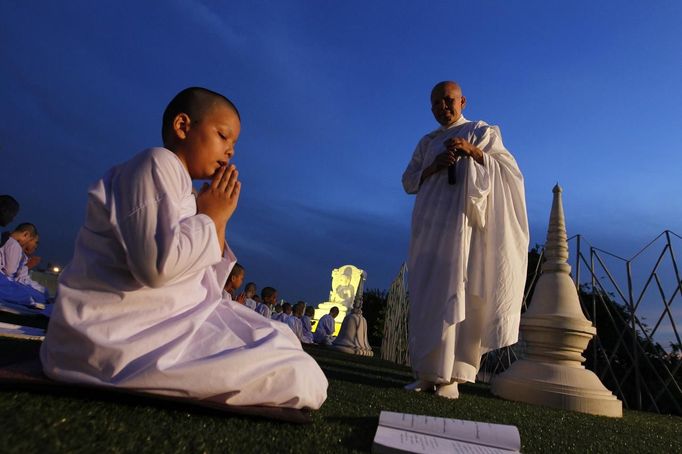 Novice Thai nuns pray at the Sathira Dammasathan Buddhist meditation centre in Bangkok