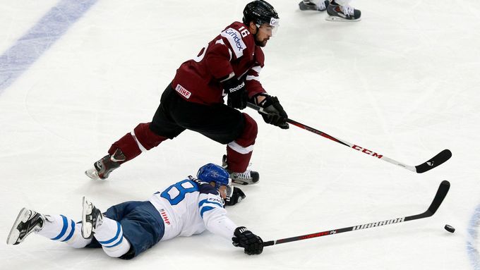 Prohlédněte si fotografie ze sobotních zápasů na světovém šampionátu hokejistů v Minsku.