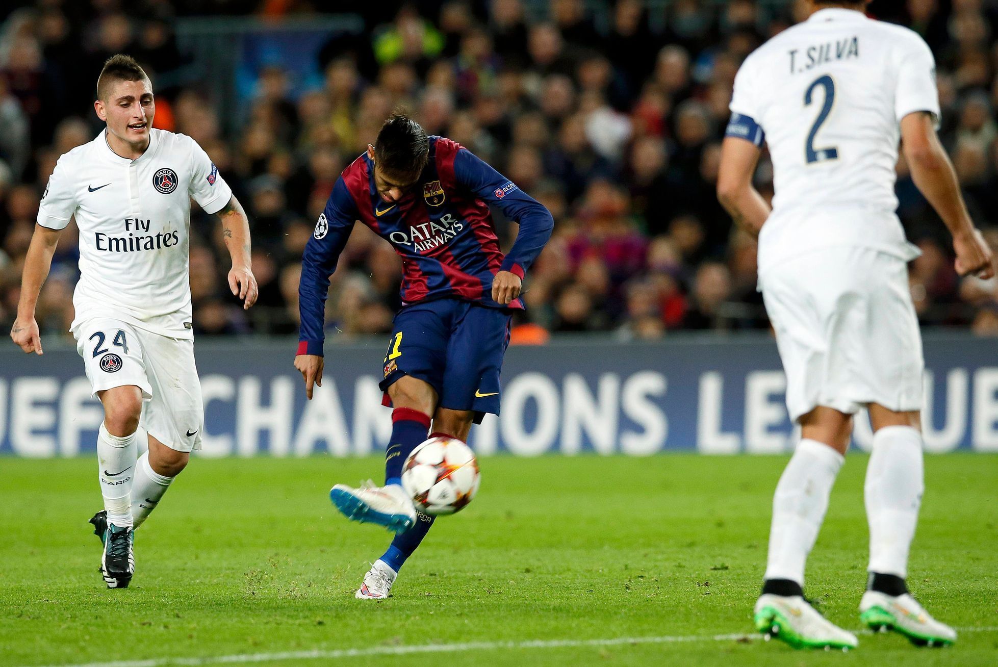 Barcelona's Neymar kicks to score a goal against Paris St Germain during their Champions League Group F soccer match at the Nou Camp stadium in Barcelona