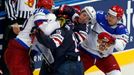 Russia's Sergei Kalinin (L) and Sergei Shirokov (R) scuffle with Craig Smith (15) and Tyler Johnson (9) of the U.S. during the second period of their men's ice hockey Wor