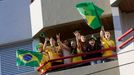 Brazil soccer fans celebrate before the opening match of the 2014 World Cup between Brazil and Croatia in Curitiba, June 12 2014. REUTERS/Henry Romero (BRAZIL - Tags: SPO