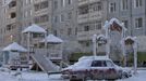 A car covered in ice is pictured near a playground in Yakutsk, in the Republic of Sakha, northeast Russia, February 4, 2013. The coldest temperatures in the northern hemisphere have been recorded in Sakha, the location of the Oymyakon valley, where according to the United Kingdom Met Office a temperature of -67.8 degrees Celsius (-90 degrees Fahrenheit) was registered in 1933 - the coldest on record in the northern hemisphere since the beginning of the 20th century. Yet despite the harsh climate, people live in the valley, and the area is equipped with schools, a post office, a bank, and even an airport runway (albeit open only in the summer). Picture taken February 4, 2013. REUTERS/Maxim Shemetov (RUSSIA - Tags: SOCIETY ENVIRONMENT) ATTENTION EDITORS: PICTURE 4 OF 27 FOR PACKAGE 'THE POLE OF COLD' SEARCH 'MAXIM COLD' FOR ALL IMAGES Published: Úno. 18, 2013, 11:25 dop.