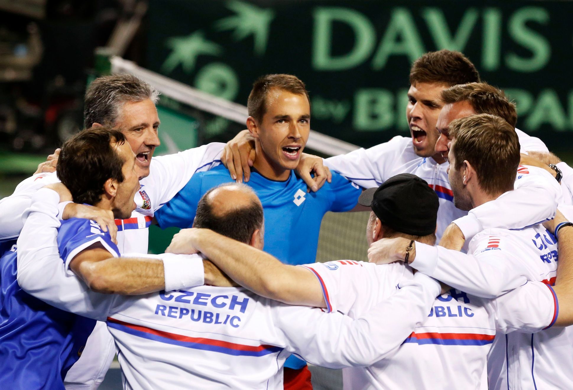 Rosol and Stepanek of the Czech Republic celebrate with their team mates after winning their Davis Cup quarter-final men's doubles tennis match against Japan's Ito and Uchiyama in Tokyo