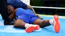 Men's Super Heavy (+91kg) Round of 16 Bout 173 - Nigel Paul (TTO) of Trinidad and Tobago falls during his bout.