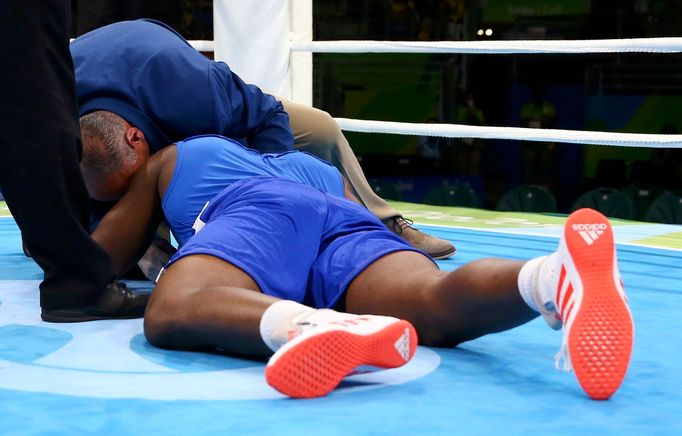 Men's Super Heavy (+91kg) Round of 16 Bout 173 - Nigel Paul (TTO) of Trinidad and Tobago falls during his bout.