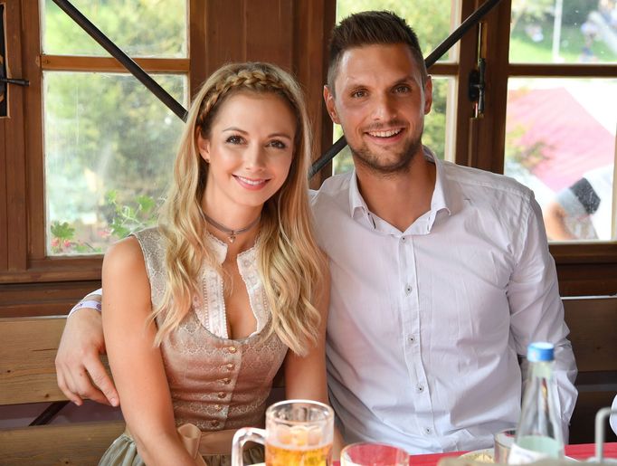 FC Bayern Munich's goalkeeper Ulreich and his wife Lisa pose during their visit at the Oktoberfest in Munich,