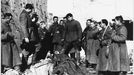 STALINGRAD FUNERAL Funeral of a Soviet soldier amidst the ruins of the contested city Date: 1942-43 Source: Unattributed photograph MELEDIN COLLECTION