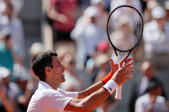 Tennis - French Open - Roland Garros, Paris, France - June 1, 2019. Serbia's Novak Djokovic reacts after winning his third round match against Italy's Salvatore Caruso. R