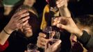 People attend the official launch of the 2012 Beaujolais Nouveau wine in the center of Lyon early November 15, 2012. REUTERS/Robert Pratta (FRANCE - Tags: SOCIETY) Published: Lis. 15, 2012, 2:05 dop.