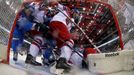 Goaltender Alexander Salak of the Czech Republic (R) saves during their men's ice hockey World Championship Group A game against Italy at Chizhovka Arena in Minsk May 14,