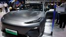 A staff member cleans the Geely Galaxy E8 electric vehicle at the Beijing International Automotive Exhibition, or Auto China 2024, in Beijing, China, April 25, 2024. REUT