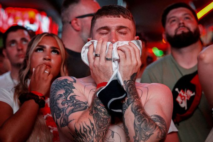 Soccer Football - Euro 2024 - Fans gather for the Final - Spain v England - Benidorm, Spain - July 14, 2024 An England fan looks dejected after losing the final REUTERS/E