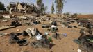 Abandoned uniforms are seen strewn across the ground at the prefecture of the recently liberated town of Konna January 26, 2013. REUTERS/Eric Gaillard (MALI - Tags: CIVIL UNREST CONFLICT MILITARY) Published: Led. 26, 2013, 2:22 odp.