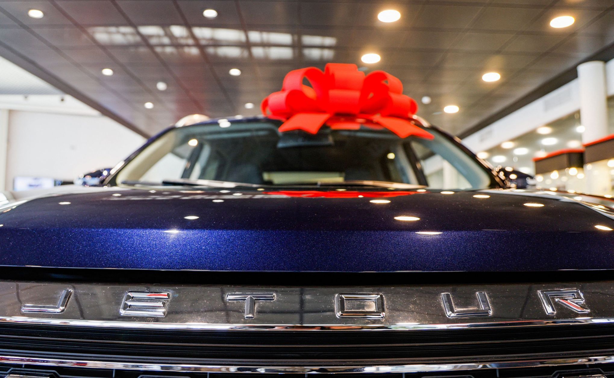 A view shows a car logo of Chinese automaker Jetour at a dealership in Lyubertsy