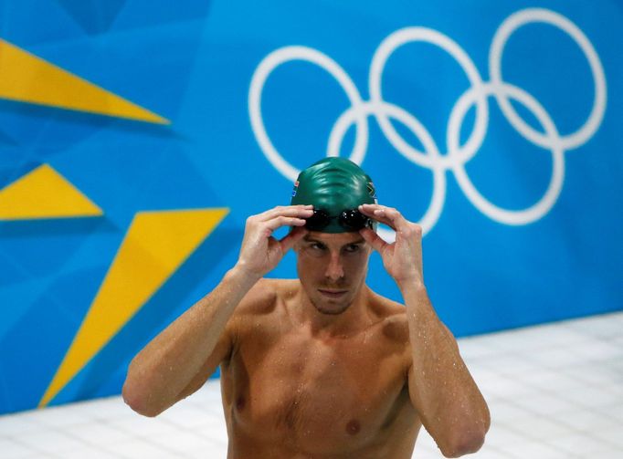 FILE PHOTO: South African swimmer Roland Schoeman attends a training session at the Aquatics Centre before the start of the London 2012 Olympic Games in London July 24, 2