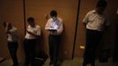 A trainee looks at the screen of his tablet device as he attends a training course at the communist party school called China Executive Leadership Academy of Pudong in Shanghai, September 24, 2012. China's Communist Party has dramatically stepped up its training of the country's roughly 40 million party and government officials in the past decade. With public scrutiny of cadre behaviour growing via social media, the party is likely to call for continued, and deepened, cadre education at the upcoming 18th Party Congress. At the vanguard of this education drive, alongside a Central Party School in Beijing, are three "Executive Leadership Academies" which opened in 2005 for middle-ranking and senior officials in Shanghai, Yan'an and Jinggangshan. The curriculum covers Marxism, Leninism and Mao Zedong Thought, but students may also take finance courses, receive in-depth media training or role-play crisis management scenarios on everything from disease outbreaks to train wrecks. REUTERS/Carlos Barria (CHINA - Tags: POLITICS SOCIETY) Published: Zář. 24, 2012, 1:59 odp.