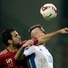 Fabregas of Spain challenges Kucka of Slovakia during their Euro 2016 qualification soccer match at the MSK stadium in Zilina