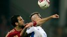 Fabregas of Spain challenges Kucka of Slovakia during their Euro 2016 qualification soccer match at the MSK stadium in Zilina