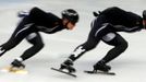 U.S. short track speed skaters Jordan Malone (L) and Eddie Alvarez practise with U.S. team members in preparation for the 2014 Sochi Winter Olympics, February 3, 2014. So