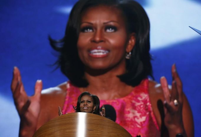 U.S. first lady Michelle Obama addresses delegates during the first session of the Democratic National Convention in Charlotte, North Carolina, September 4, 2012. REUTERS/Jim Young (UNITED STATES - Tags: POLITICS ELECTIONS) Published: Zář. 5, 2012, 3:20 dop.