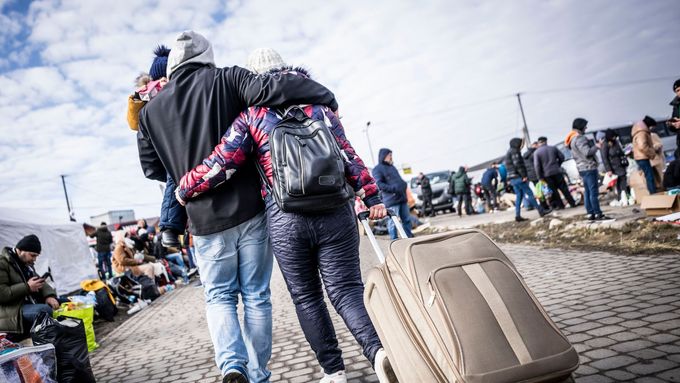 Uprchlíci z Ukrajiny na polské straně hranice v obci Medyka.
