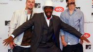 V popředí haitský rapper Wyclef Jean